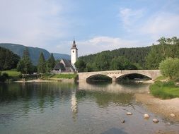 Stone bridge over the lake bohinj