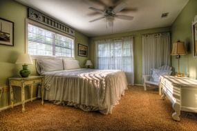 bedroom interior with vintage wooden furniture