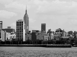 Black and white photo of city skyline with hudson river in Nyc, Manhattan, USA