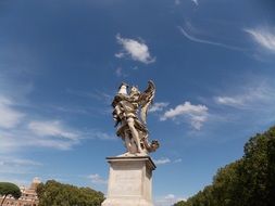 angel with column at sky, statue on Bernini Bridge, Italy, Rome