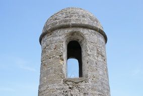 stone tower of medieval fort at sky