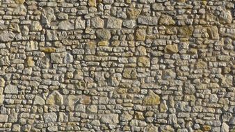 old grey wild stone wall