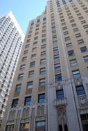 gothic details on modern facade of skyscraper in city, usa, california, san francisco