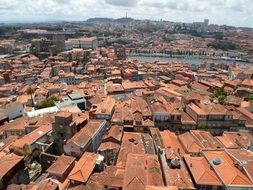 red tile roofs in panorama of city, portugal, porto