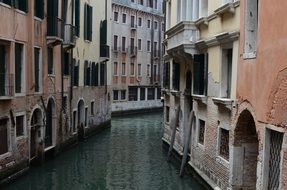 grunge old houses at narrow channel, italy, venice