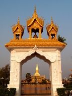 traditional gates at golden wat pha-that luang pagoda, Laos, Vientiane