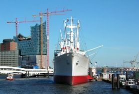 ship in port in view of city, germany, hamburg