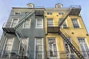 staircases on backside of old house, fire escapes