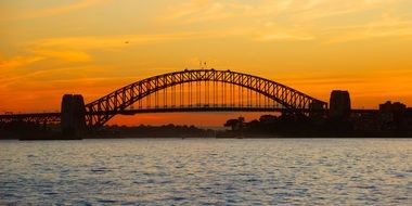 harbor bridge silhouette at sunset sky, australia, sydney
