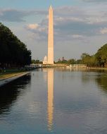 washington monument, obelisk with reflection on pond, usa, washington dc