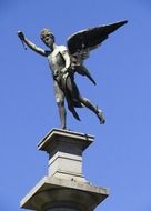 winged man sculpture at sky, argentina, buenos aires