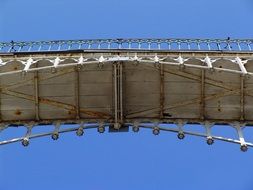 bottom view of old pedestrian bridge at sky, germany, berlin