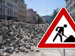 road works sign at construction site in town