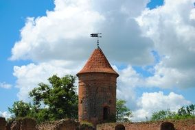 view of the tower of destroyed the castle in the village of Szymbark, Poland