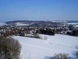 City winter snow trees view