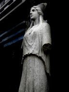 damaged marble woman, sculpture on cemetery