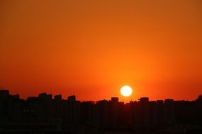 landscape of orange sunset over the city