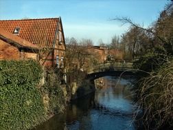 bridge across channel at old truss house