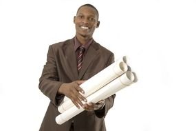 smiling dark skin man with rolled sheets of paper in hands