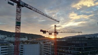 sunset over a construction site in zurich