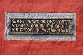 inscription on the red building