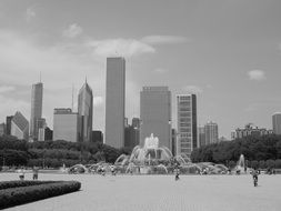 fountain in park at city skyline, usa, illinois, chicago