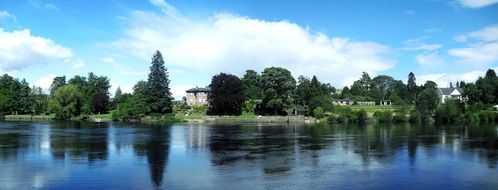 buildings on bank of tay river at summer, uk, scotland, perth