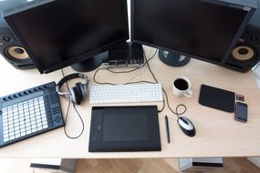 computer and accsessories on desk, graphics station