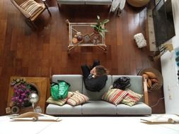 woman sitting on the sofa in the living room