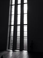 modern tall narrow window in a dark