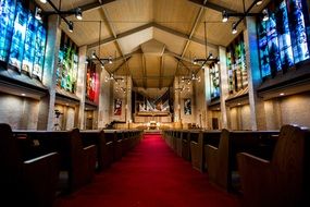 Wooden benches in church interior