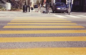 yellow crosswalk for pedestrians