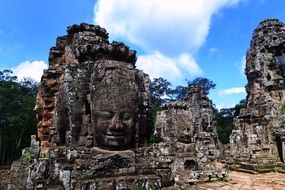 stone buddha faces, ancient khmer ruins, cambodia, seam reap