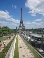 people walking in view of eiffel tower, france, paris