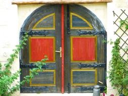 bright painted wooden door of old house