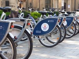 bicycles with luggage racks on parking in city, poland, krakÃ³w