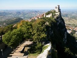 Rocca or Guaita fortress tower on mountain above countryside, san marino