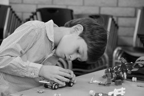black white photo lego toys boy build