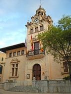 city hall, old building with flags on facade, spain, majorca