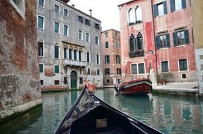 boat on water at colorful facade, italy, venice