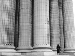 woman at giant classical columns