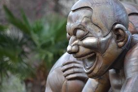 laughing man face, sculpture