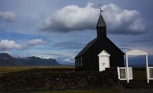 old village church in rural landscape, iceland