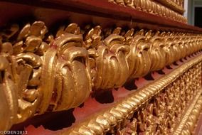 golden monograms in the temple