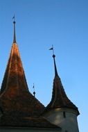 oldtime towers with spires at sky