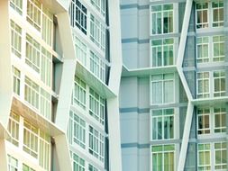 new multi-storey apartment with pale colored facade