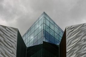 Angled glass facade of modern building