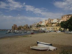 boats on beach at harbour town, italy, sicily