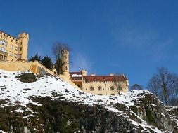 hohenschwangau castle on mountain at winter, germany, fÃ¼ssen