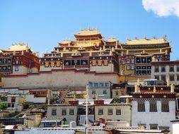 colorful traditional buildings of tibetian buddhist Ganden Sumtsenling Monastery, china